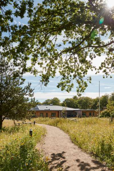 Homes and facilities for autistic residents, clad in wood and steel profiles, and surrounded by forest, AutismeCenter Skive, Jægervej 16, 7800 Skive
